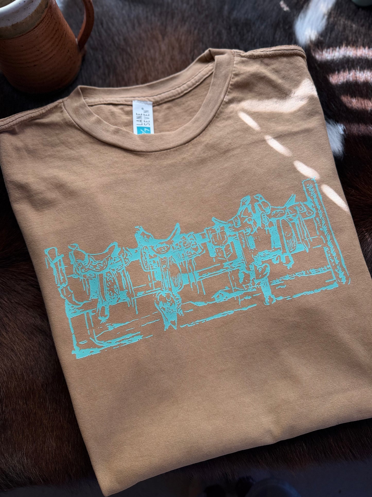 Teal Saddles On A Fence Tee - Carmel